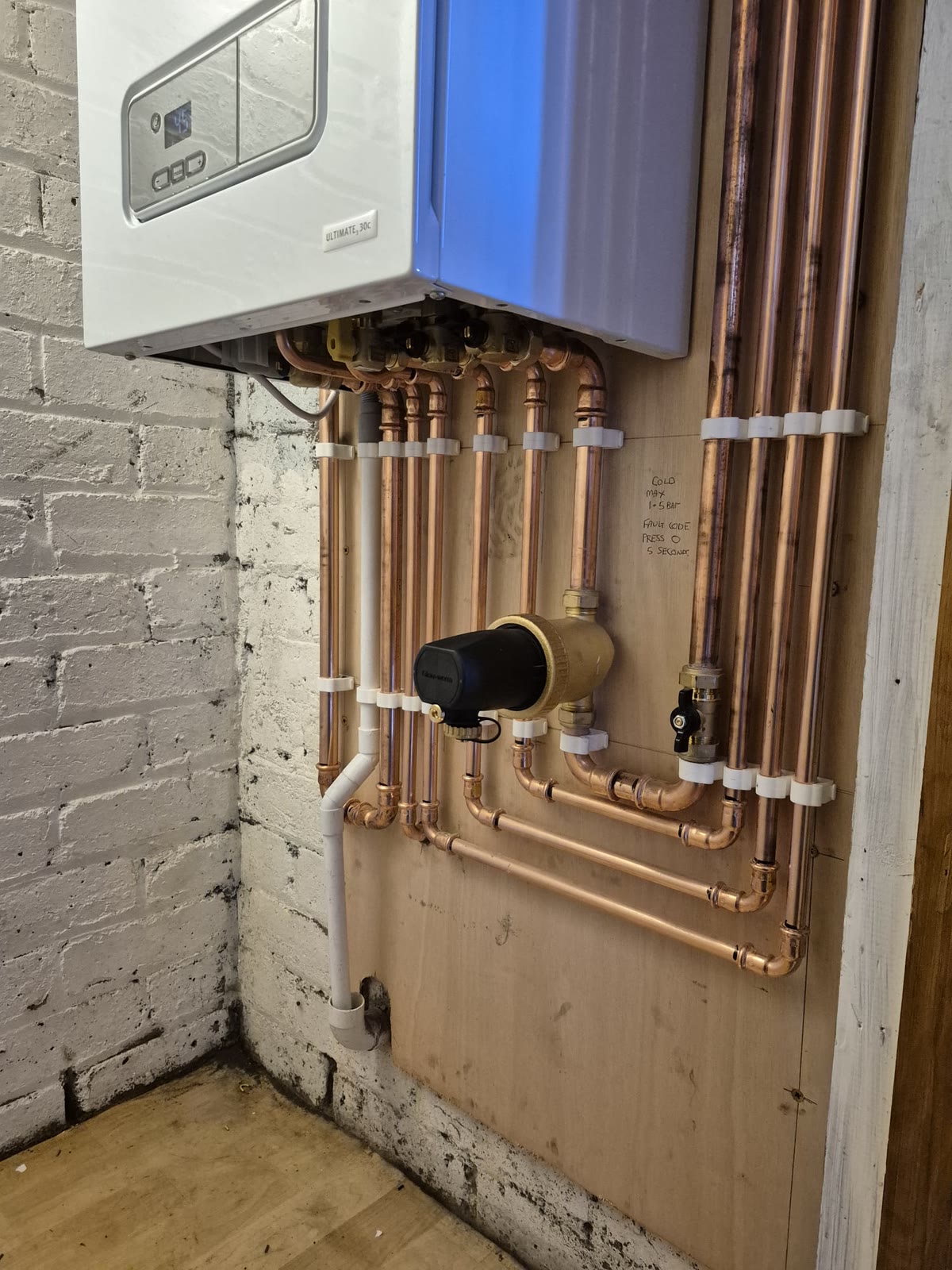 Neat boiler and pipework installation